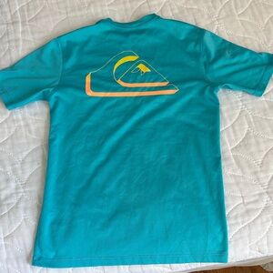 Kanu Surf Teal Short Sleeve Tee with Orange and Yellow Logo